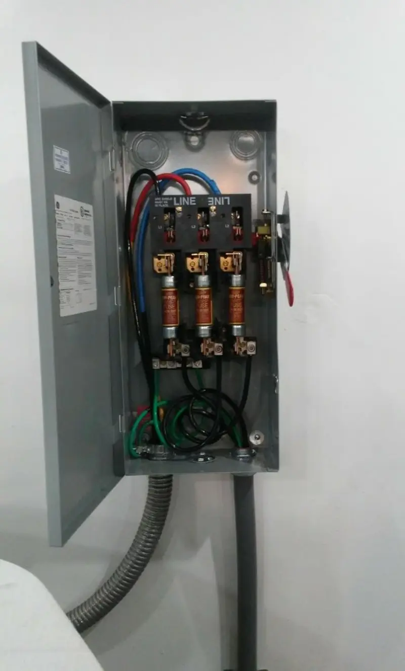 Three-phase disconnect switch installed for Smoke Detector Installation in Greenville